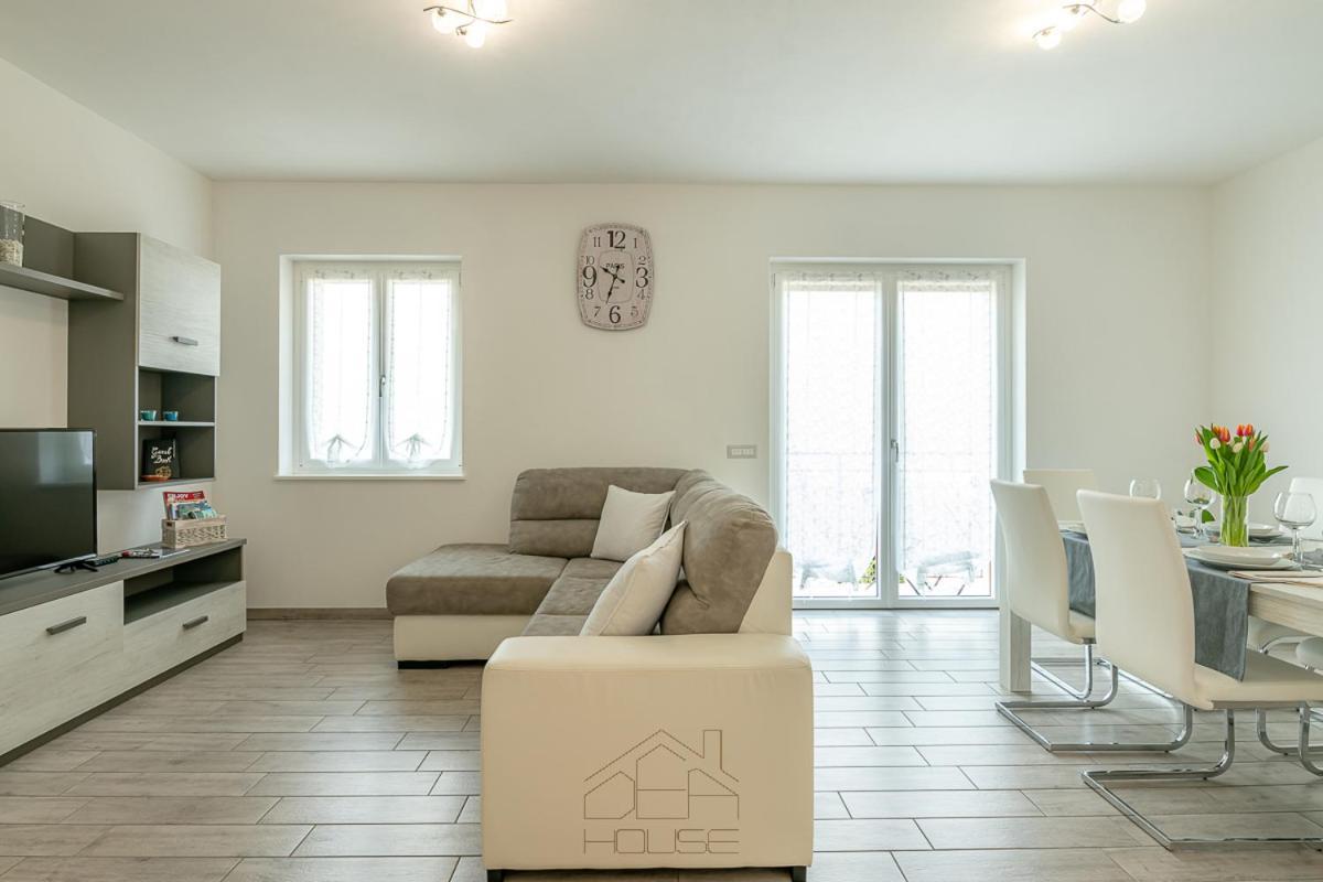 Dea House Apartamento Nesso Exterior foto
