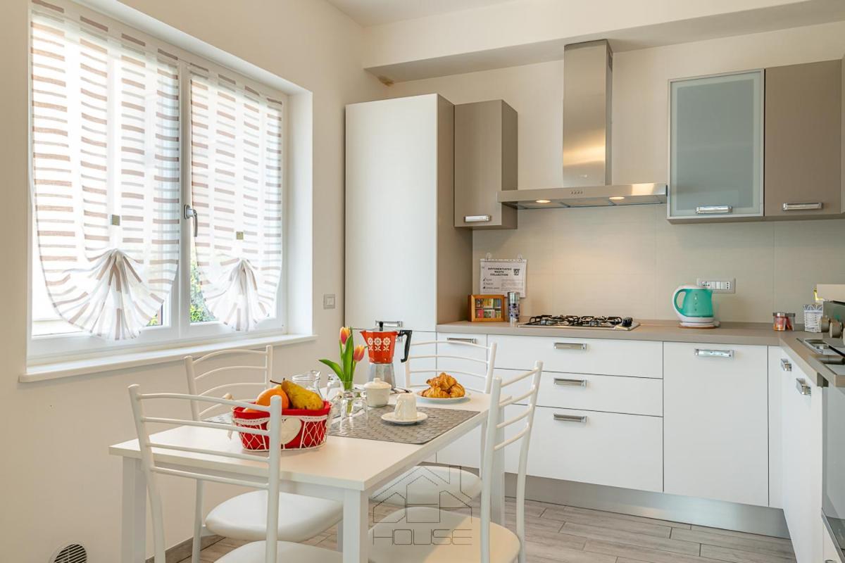 Dea House Apartamento Nesso Exterior foto